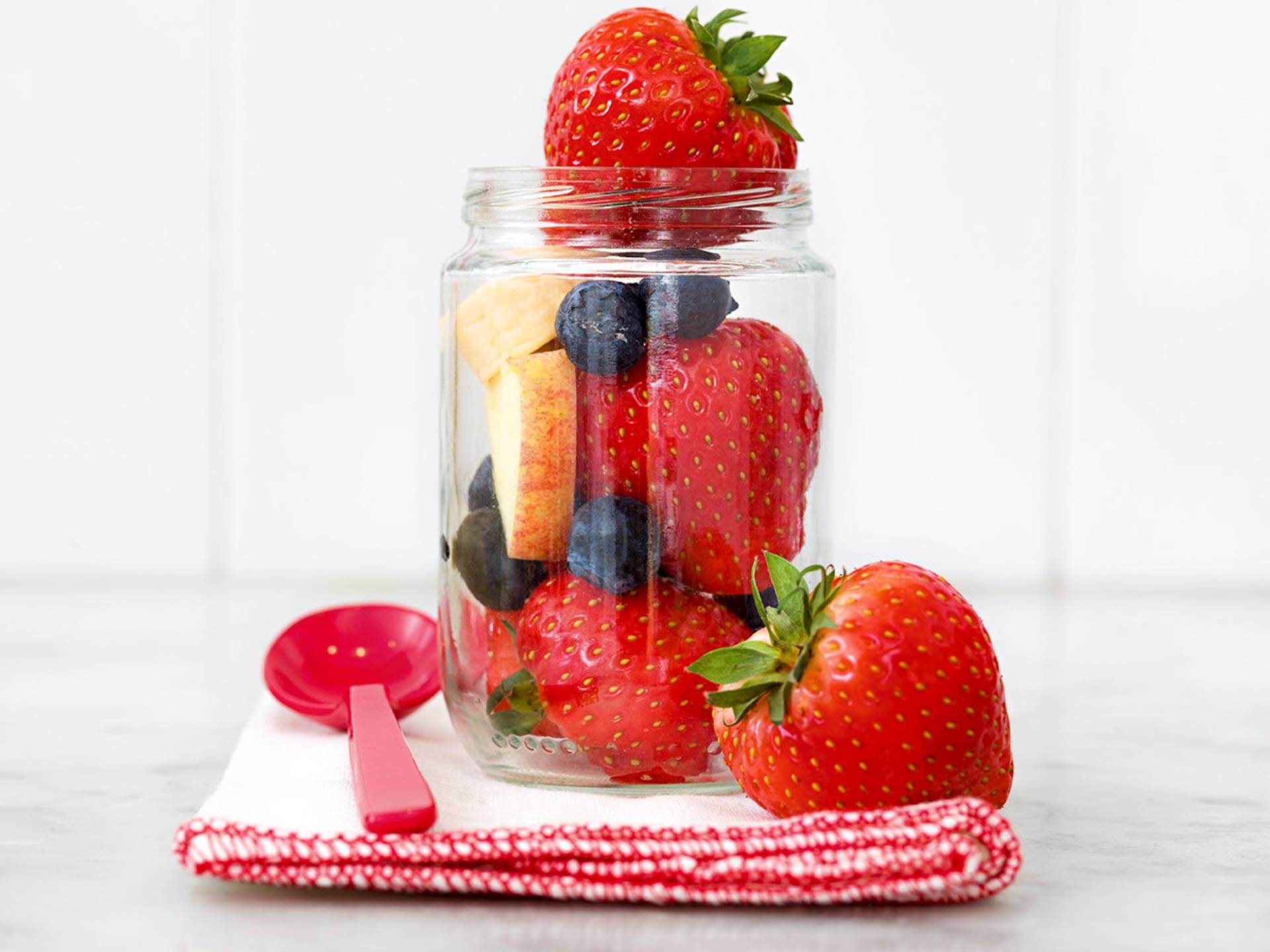 Glass with strawberries