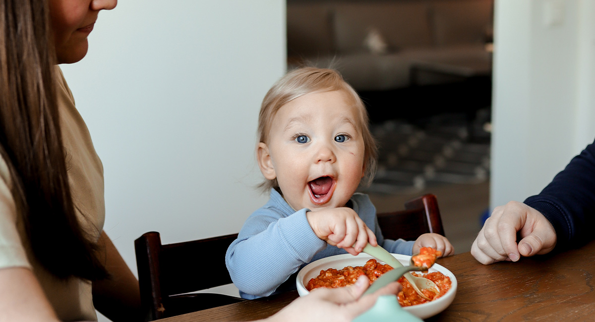 Happy baby eating