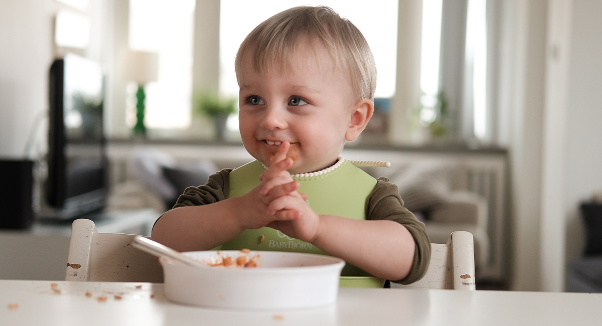 Banner happy boy at table