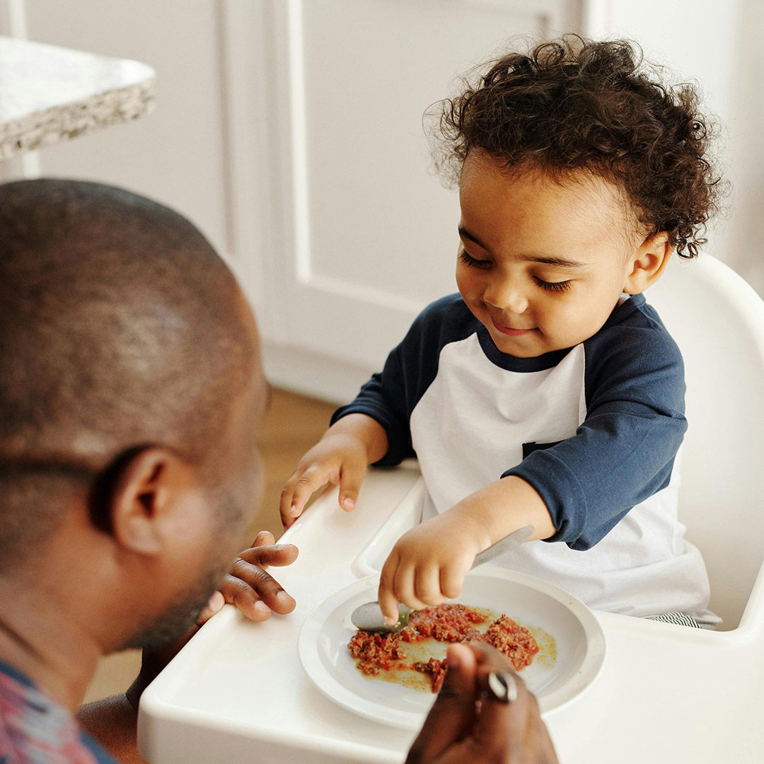 Father and child eating